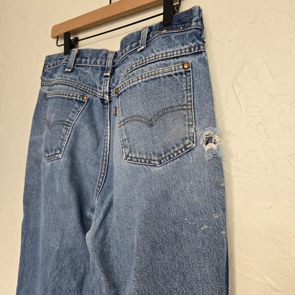 Vintage Levi's 557 Cowboy Distressed Jeans